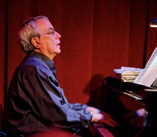 Kenny Ascher playing piano