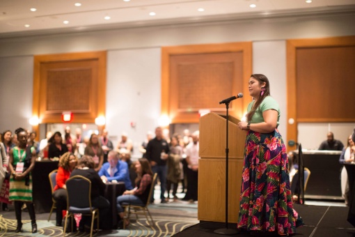 Native American Woman speaking at conference